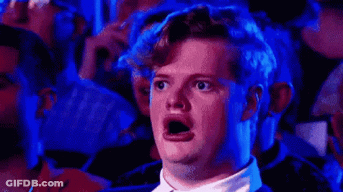 Surprised Man In Theatre GIF