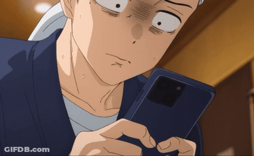 Surprised Man Looking At Cell Phone GIF