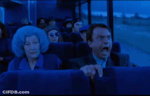 Surprised Man Sitting On Bus GIF