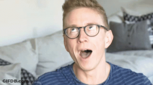 Surprised Man With Glasses And Blue Shirt GIF