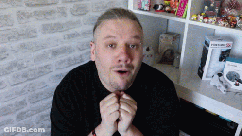 Surprised Man With Videomic 25 Box GIF