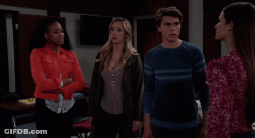 Surprised Woman Between Two Women GIF