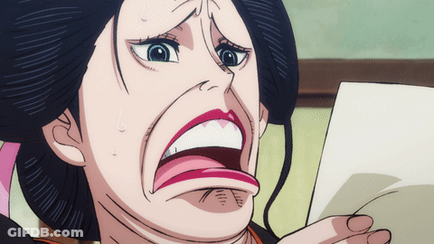 Surprised Woman Holding Paper GIF