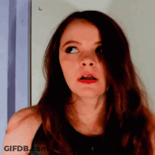 Surprised Woman In Black Tank Top GIF
