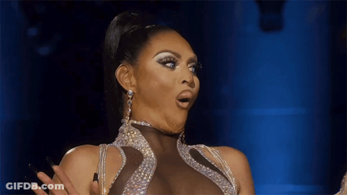 Surprised Woman In Rhinestone Dress GIF