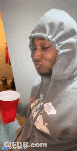 Surprised Woman In Rhinestone Dress GIF