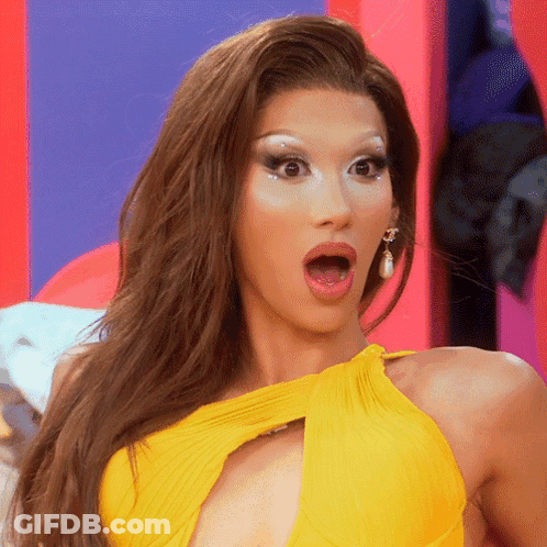 Surprised Woman In Yellow Dress GIF