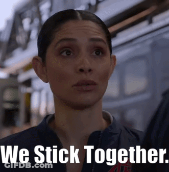 Surprised Woman Next To We Stick Together GIF