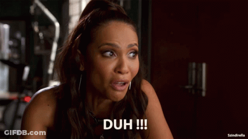 Surprised Woman Saying Duh GIF