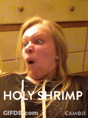 Surprised Woman Saying Holy Shrimp GIF