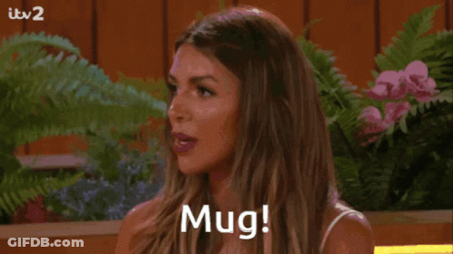 Surprised Woman Saying Mug GIF