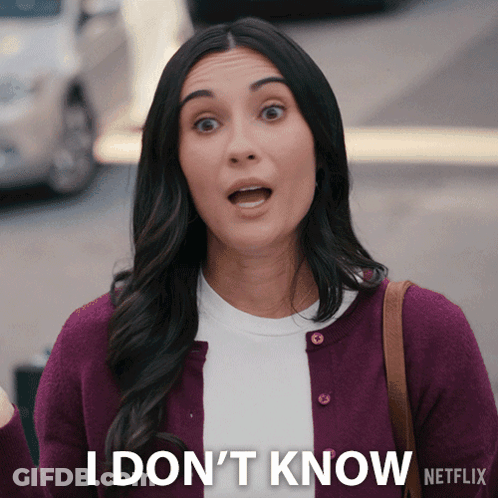 Surprised Woman Says I Don't Know GIF