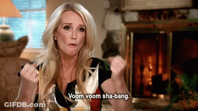 Surprised Woman Wearing WOW Shirt GIF