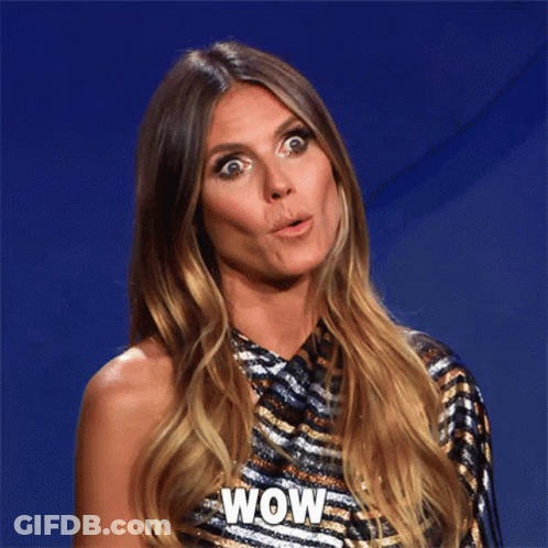 Surprised Woman Wearing Wow Shirt GIF