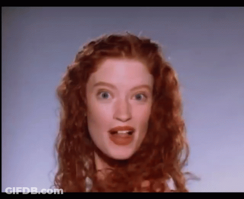 Surprised Woman With Red Hair GIF