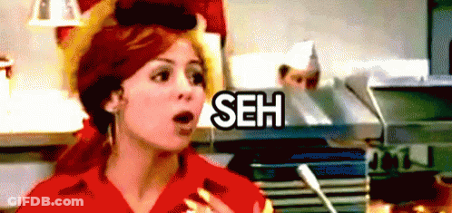 Surprised Woman With Word Seh Behind Her GIF