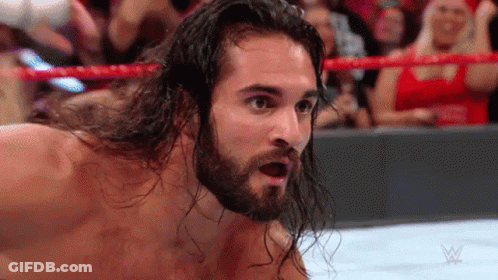 Surprised Wrestler With Long Hair And Beard In Crowd GIF