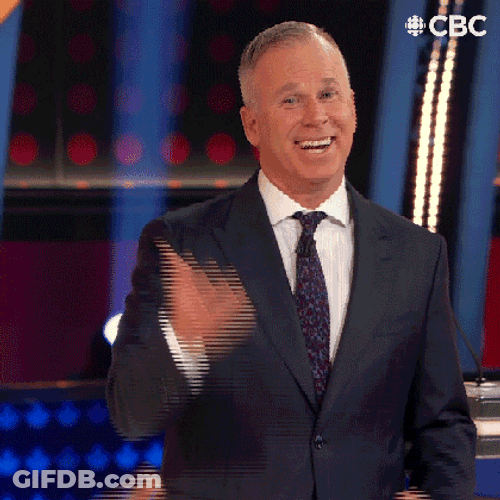 Survey Says Gerry Dee Hand Gesture While Smiling GIF