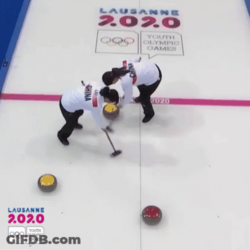 Sweeping In Olympic Curling GIF