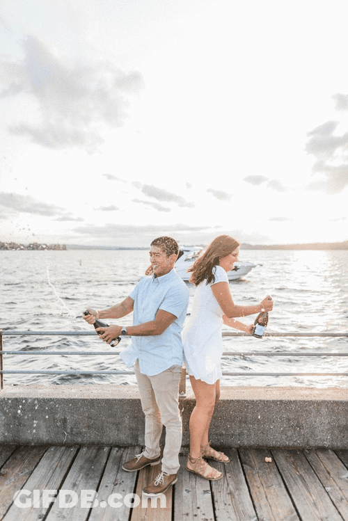 Sweet Couple Champagne Popping GIF