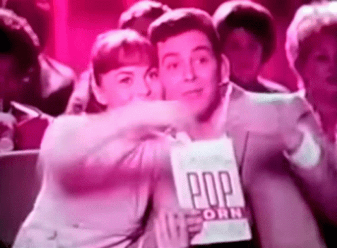 Sweet Couple Eating Popcorn GIF