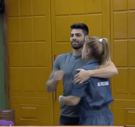Sweet Couple Inmates Hug And Forehead Kiss GIF