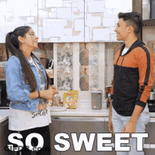 Sweet Couple Pinching Cheeks GIF