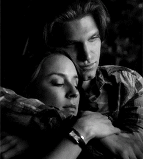 Sweet Couple Sharing Passionate Kiss GIF