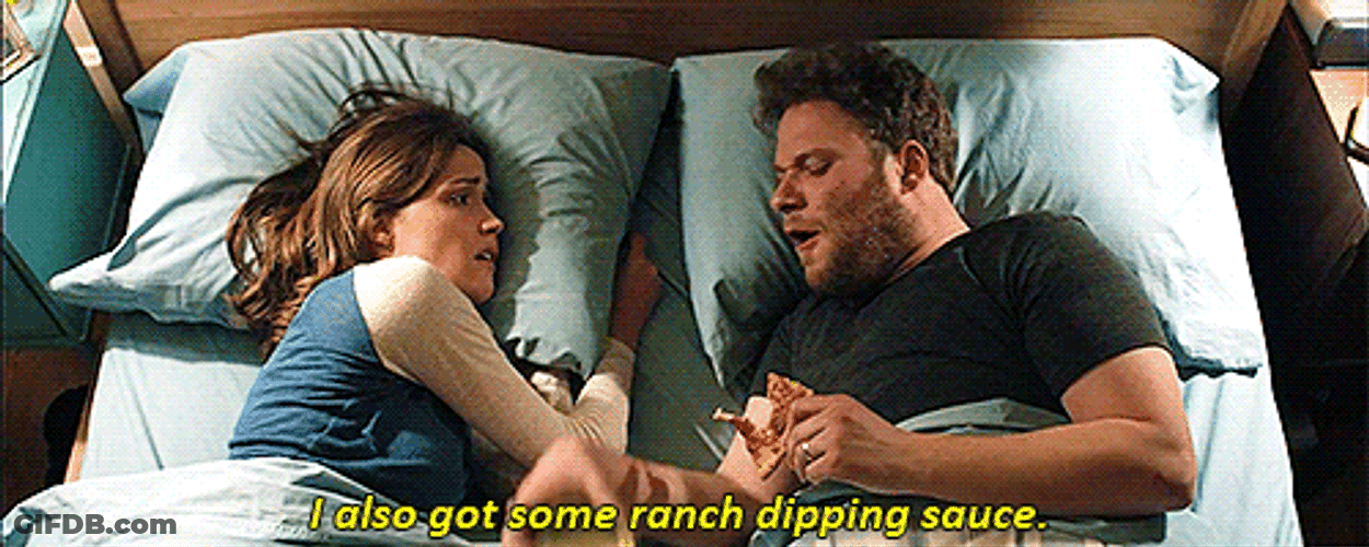 Sweet Couple Talking And Eating In Bed GIF
