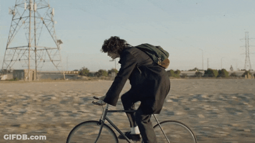 Swiftly Riding Bike GIF