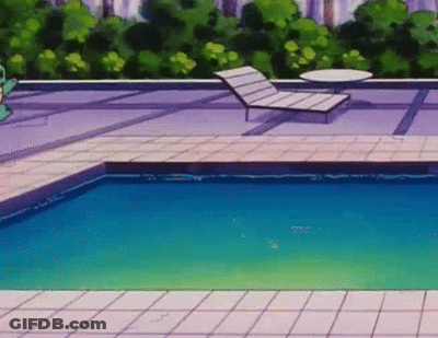 Swimming Pool Surrounded By Chairs And Table GIF