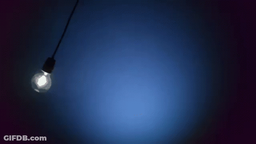 Swinging Light Bulb Blue Vignette GIF