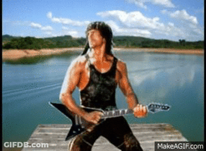 Sylvester Stallone As John Rambo Playing Guitar Lake GIF