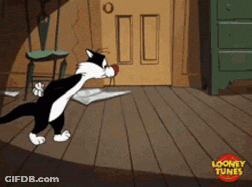 Sylvester The Cat Looking For Something In A Room GIF