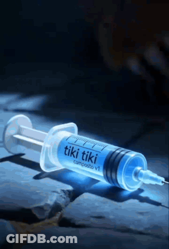 Syringe With Blue Liquid Saying Tiki Tiki GIF