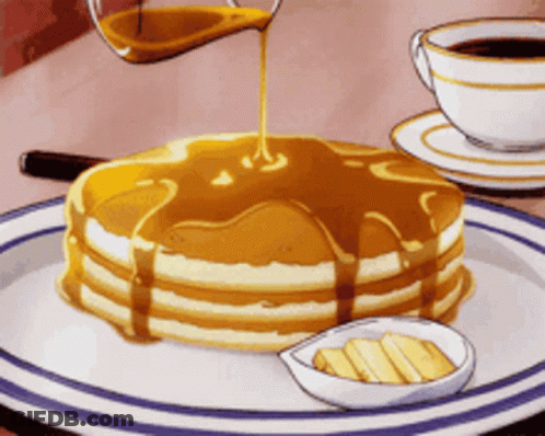 Syrup Is Being Poured On A Stack Of Pancakes GIF