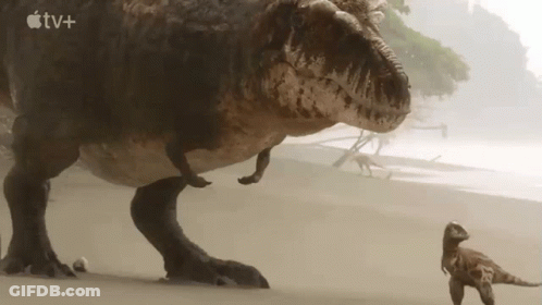 T-Rex And Baby T-Rex On Sandy Beach With Apple TV+ Logo GIF