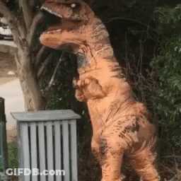 T-Rex Costume Standing By Trash Can GIF