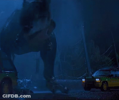 T-Rex Standing In Front Of Car Jurassic Park GIF