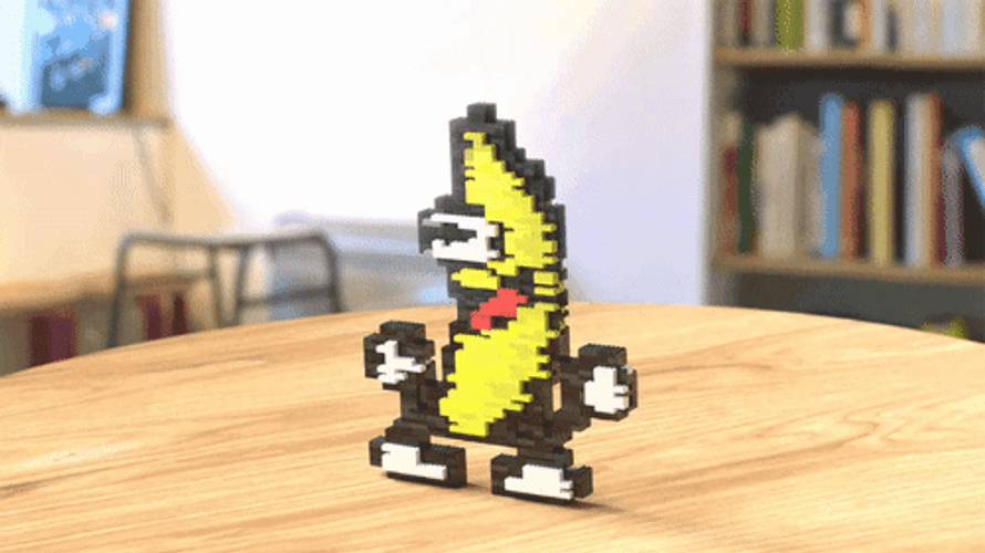 Table Top Pixelated Dancing Banana GIF