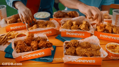 Table Topped With Popeyes Chicken And Fries GIF