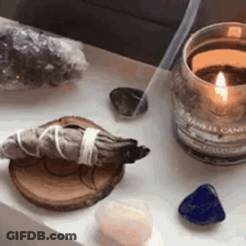 Table With Candle Sage Crystals Incense Sticks GIF