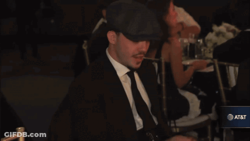 Table With Plates And AT&T Sign GIF