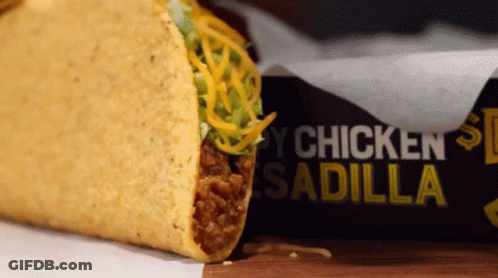 Taco Next To Box Saying Chicken Sadilla GIF