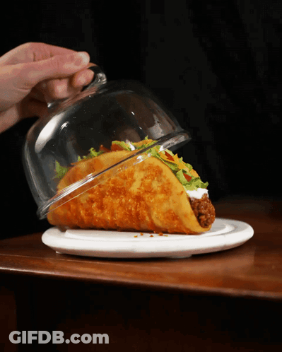 Taco On Plate With Glass Dome GIF