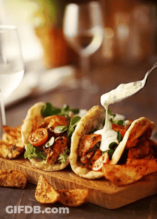 Taco Spreading With Sauce GIF