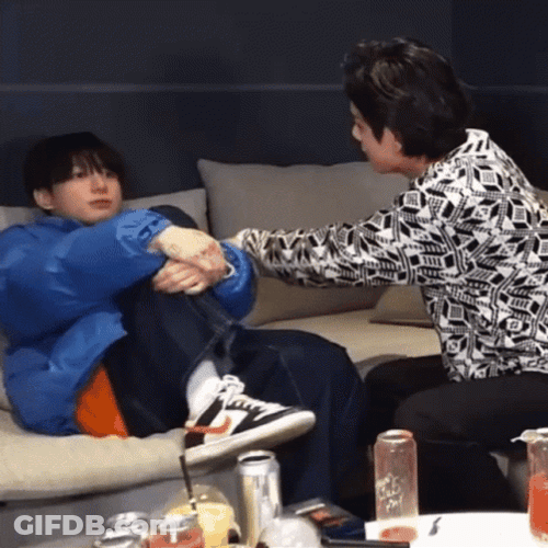 Taekook Hitting The Arms GIF