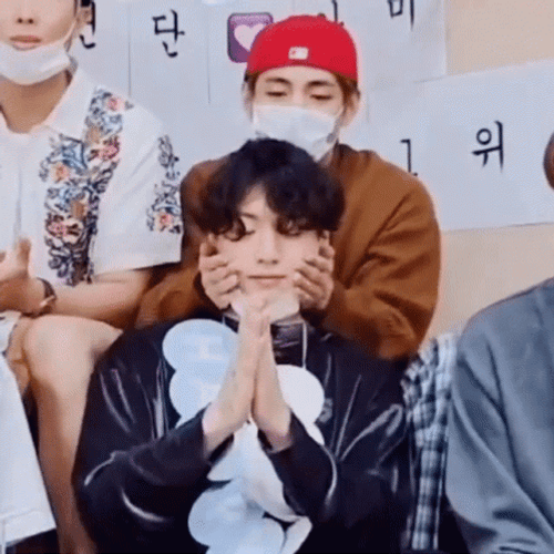 Taekook Touching Cheeks GIF
