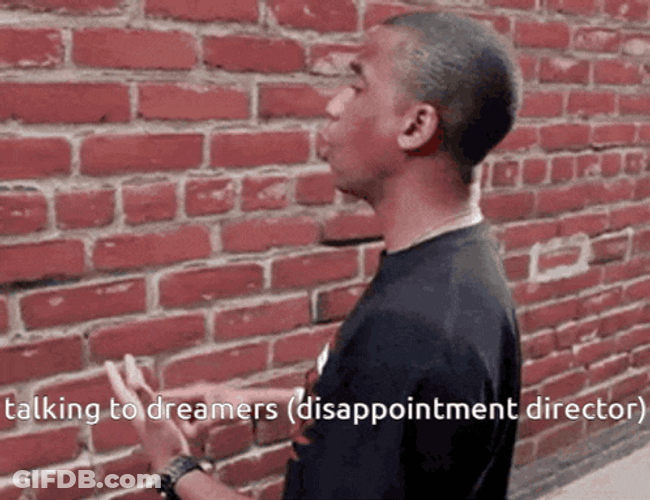 Talking To A Wall GIF