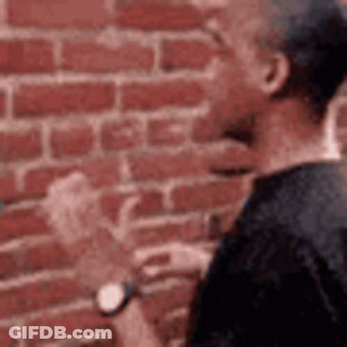 Talking To Wall Not Listening GIF